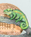 1/12th scale hand sculpted and painted model of a chameleon. Size: 15mm long